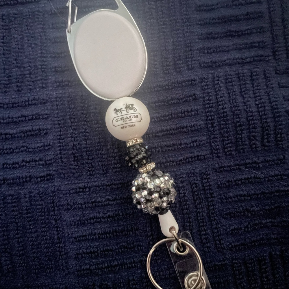 Coach White and Black Badge Reel